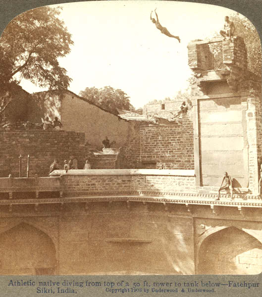 Vintage India Photos 1900, Man dives from the top of a 50 ft tower into a tank below